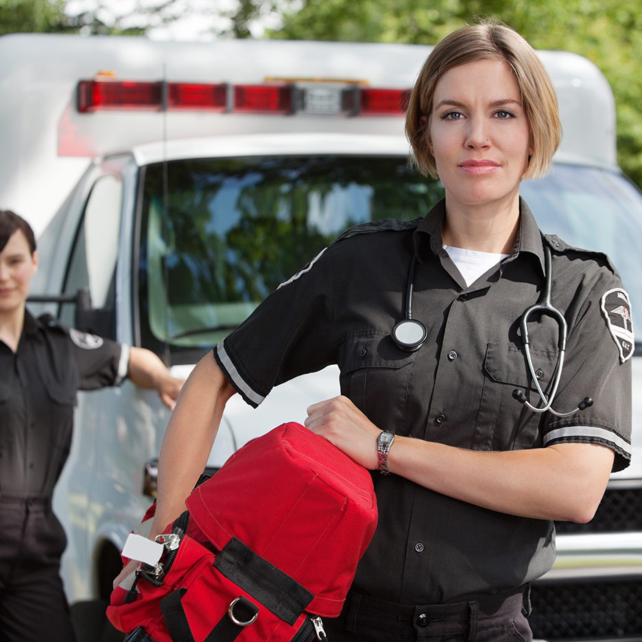 EMS with Oxygen EMS professional with portable oxygen equipment